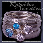 Sterling Silver, Teal Topaz, Paraiba Blue Topaz and Sworovski Cubic Zirconias 'Revelry' Stacker Rings Image