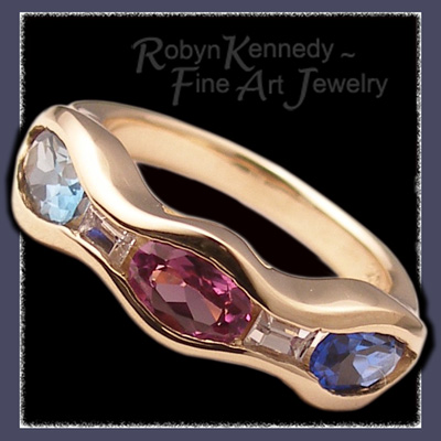 Gold, Blue Topaz, Alexandrite and Sapphire Family Birthstone Ring with 'Diamond' Accents Image