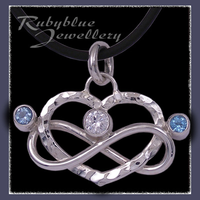 Sterling Silver, Aquamarine, Cubic Zirconia and Blue Zircon 'Love Forever' Pendant Image