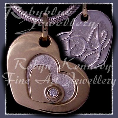 14 Karat White Gold and Diamonds 40th Anniversary Floating Heart Pendant Image