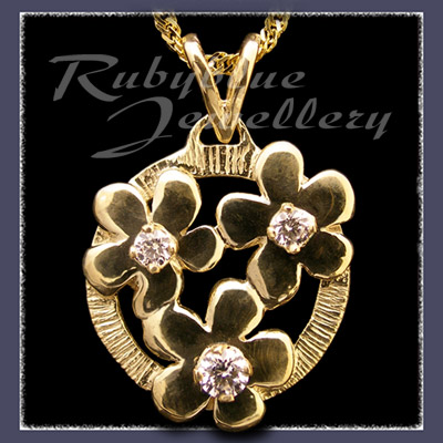 Gold 'Circle of Flowers' Pendant with April Birthstones Image