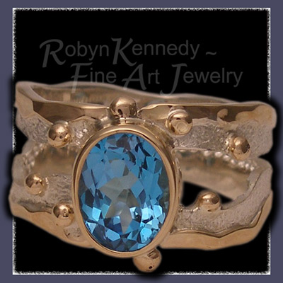 10 Karat Yellow Gold, Sterling Silver and Swiss Blue Topaz 'Blue Lagoon', One-of-a-Kind Ring Image