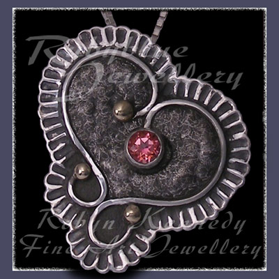 10 Karat Yellow Gold, Sterling Silver and Pure Pink Topaz 'Braveheart' Pendant / Brooch Image