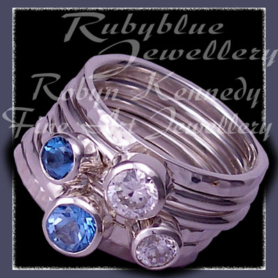 Sterling Silver, Ice and Swiss Blue Topaz and Swarovski Cubic Zirconias, 'Revelry' Stacker Ring Set Image