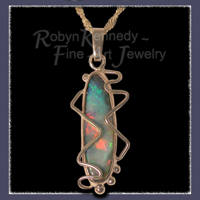18 and 14 Karat Yellow Gold and Natural White Opal Pendant Image