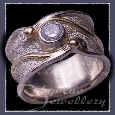 10 Karat Yellow Gold, Sterling Silver and Cubic Zirconia 'Serenity' Ring Image