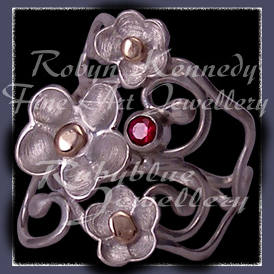 10 karat Yellow Gold, Sterling Silve and AA Ruby Gemstone 'Feeling Groovy' Ring Image