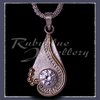10 Karat Yellow Gold, Sterling Silver & Cubic Zirconia 'Dreamland'  Pendant Image