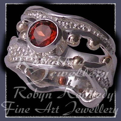 10 Karat Yellow Gold, Argentium Silver & Mozambique Garnet  'Jovial' Ring Image