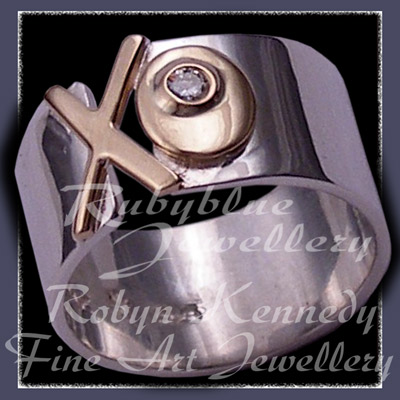 Diamond, 14 karat Yellow Gold and Sterling Silver 'Kiss ~ Hug' Ring Image