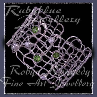 Peridots, Cubic Zirconias and Sterling Silver 'Brilliance' Cuff Bracelet Image