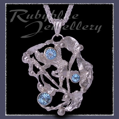 Sterling Silver, Ice Blue Topaz, Sky Blue Topaz & Swiss Blue Topaz 'Phoenix' Pendant