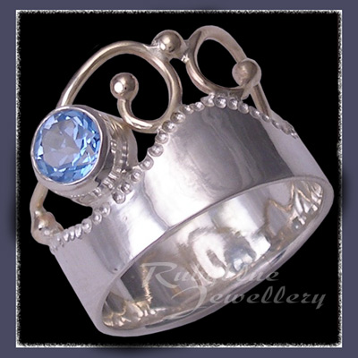 14 Karat Yellow Gold, Sterlium Sterling Silver and Genuine Ice Blue Topaz 'Twilight' Ring Image