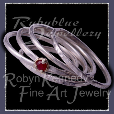Sterling Silver, 18 Karat Yellow Gold and Ruby 'Twinkles' Stacker Ring Set Image